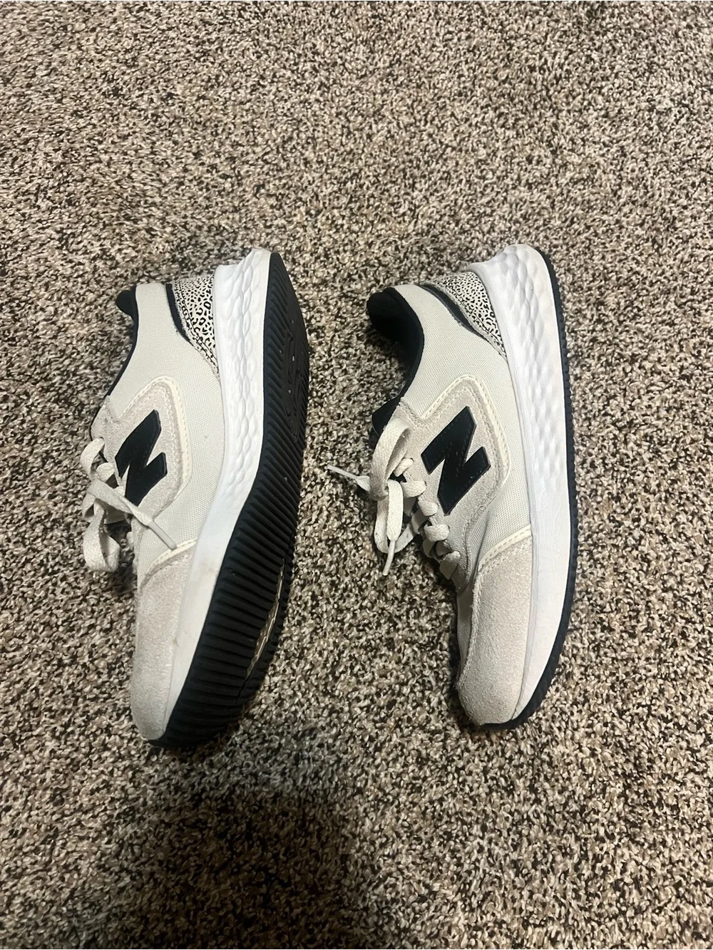 New Balance White Sneakers with Black Interior and Logo